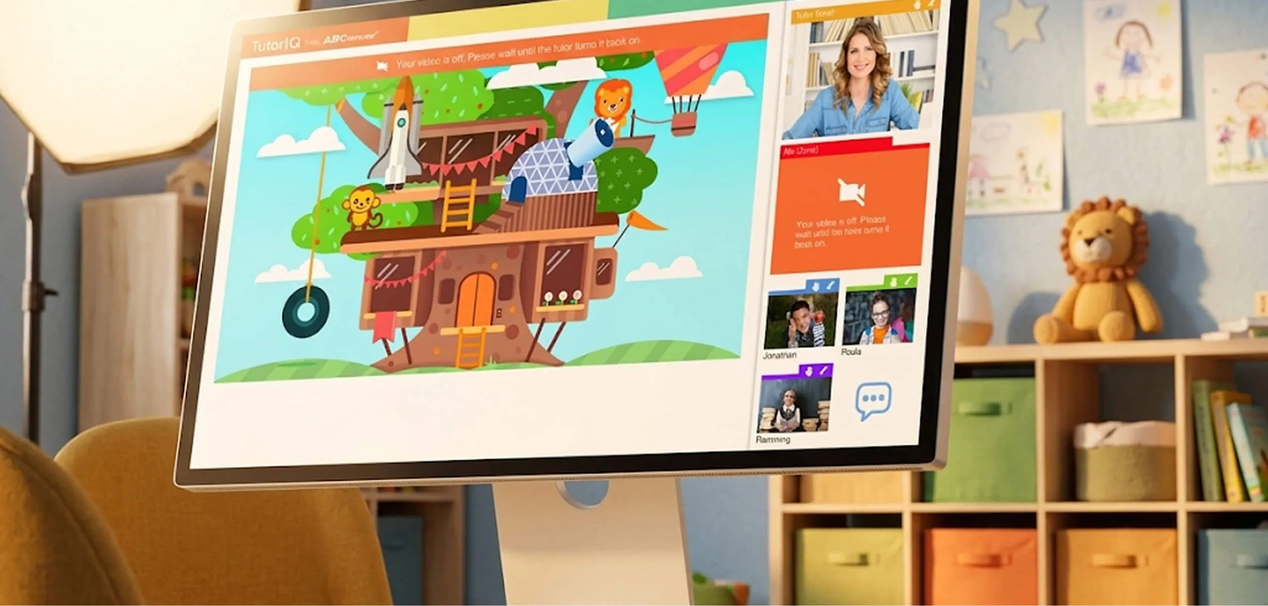 The Age of Learning platform shown on a monitor in a child's room